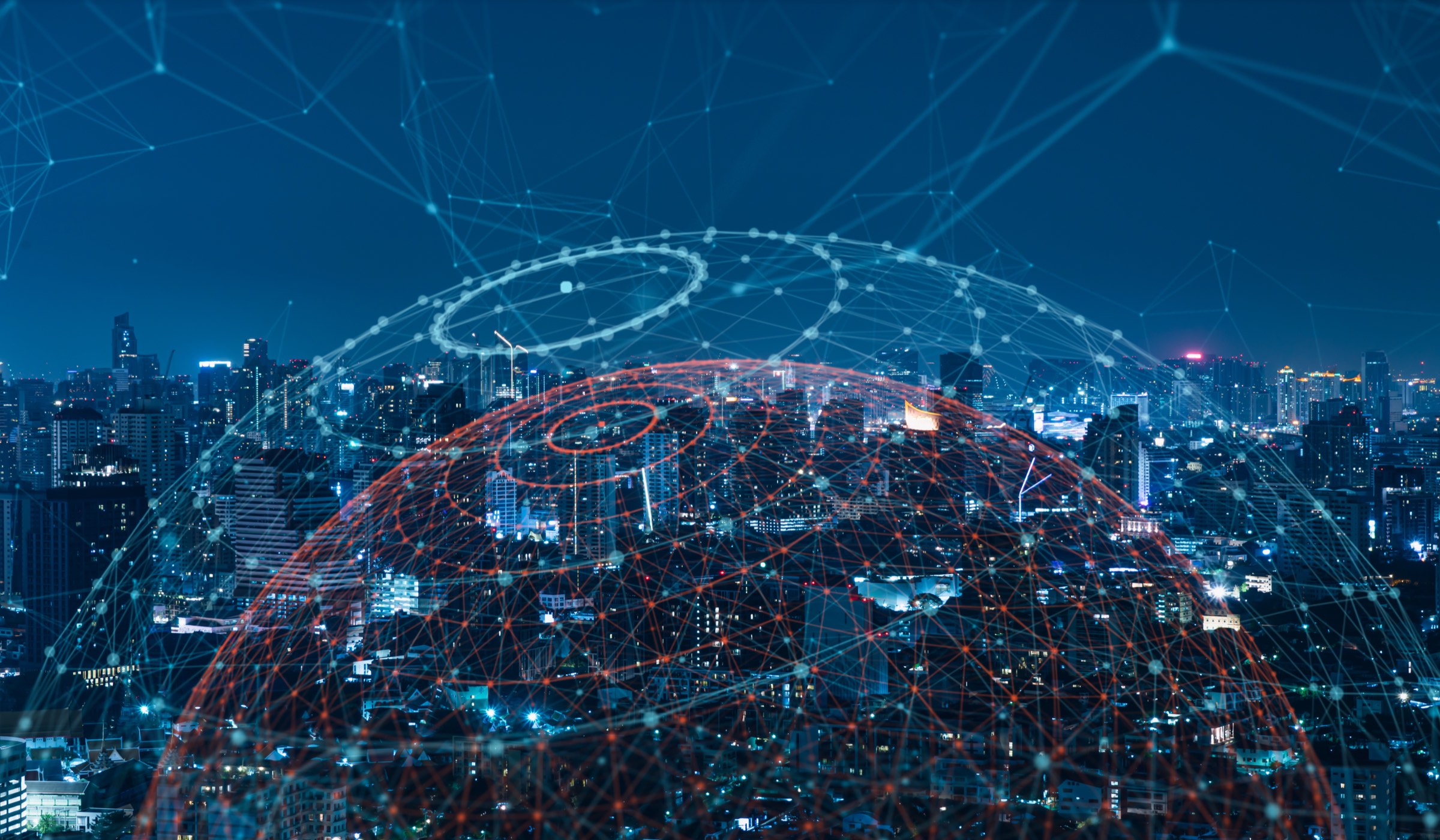 A network of properties over a city at night